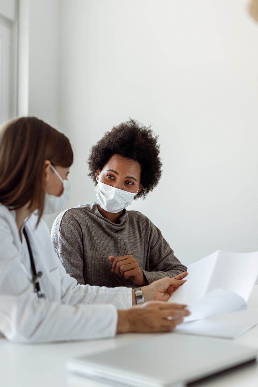 Black woman visiting doctors clinic.